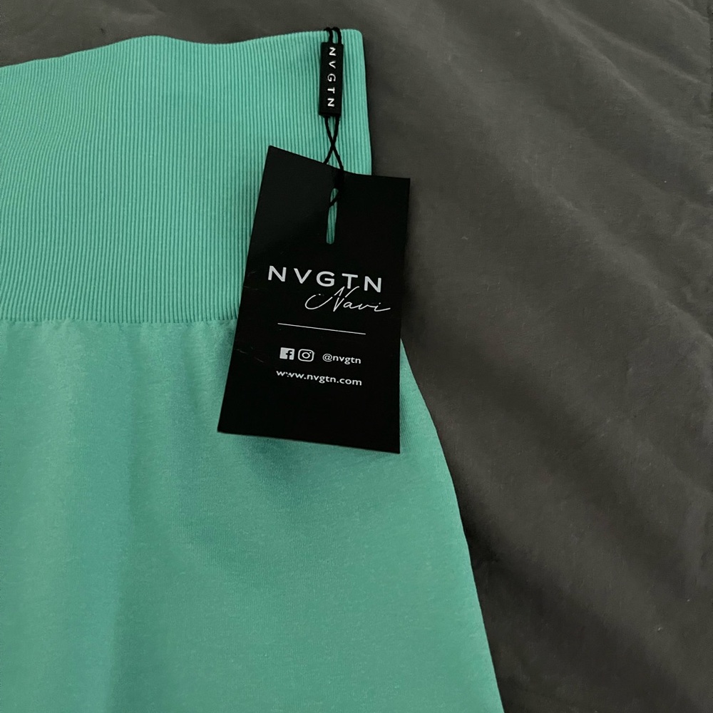 Brand-new mint green little tight for me